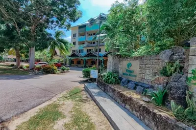 a view of the hotel from the street at Virgo Batik Resort, Teluk Batik in Lumut