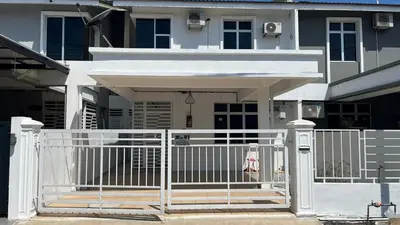 a white fence in front of a house at Memoir Perda in Bukit Mertajam