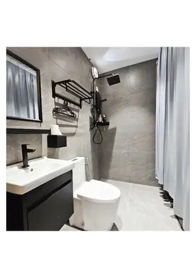 a bathroom with a white toilet and a sink at MI LE GARDEN Chalet in Sekincan