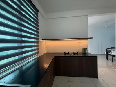 a kitchen with a counter and a large window at SPICE Skyview Luxe Tunas 4B3B in Bayan Lepas
