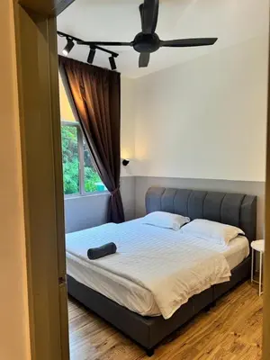 a bedroom with a bed with a ceiling fan at Ayaan Snookers House 2 at Quintet Cameron Highland in Tanah Rata