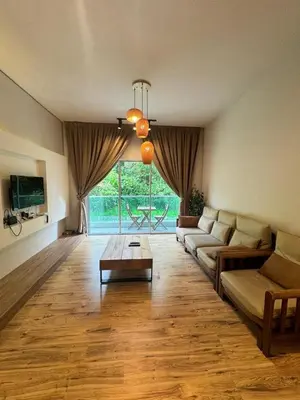 a living room with a couch and a coffee table at Ayaan Snookers House 2 at Quintet Cameron Highland in Tanah Rata
