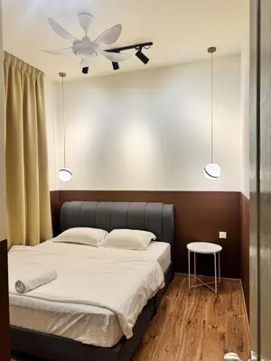 a bedroom with a bed with a ceiling fan at Ayaan Snookers House 2 at Quintet Cameron Highland in Tanah Rata