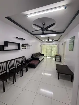a living room with chairs and a ceiling fan at DND Homestay Sitiawan in Sitiawan