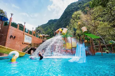 a group of people playing in a water park at Golden Roof Hotel Sunway Ipoh in Ipoh
