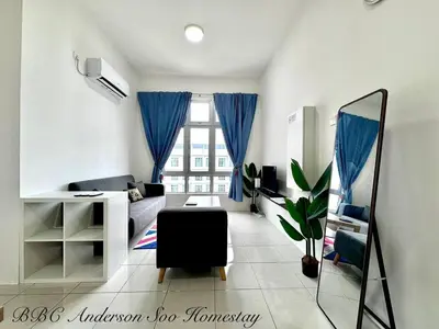 a living room with a couch and a window at BBC Anderson Soo Homestay in Ipoh