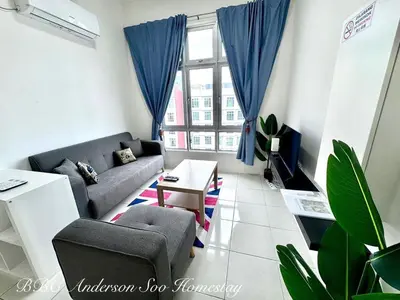 a living room with a couch and a table at BBC Anderson Soo Homestay in Ipoh