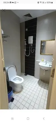 a bathroom with a toilet and a sink at The Haven 3 rooms residence Ipoh in Ipoh