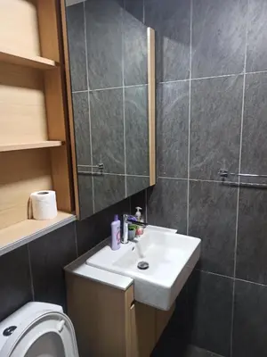 a bathroom with a sink and a toilet at Kuala Lumpur in Gua Sai