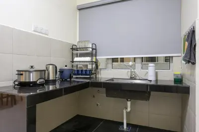 a kitchen with a sink and a counter top at Blissful Escape Perfect Homestay for Families & Friends Brinchang Clover Home 3-03A in Brinchang