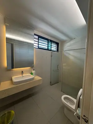 a bathroom with a sink and a toilet and a shower at Batu Ferringhi PoolBBQ 5minBeach Night Market20pax in Batu Ferringhi