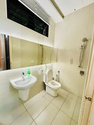 a bathroom with a toilet and a sink at Batu Ferringhi PoolBBQ 5minBeach Night Market20pax in Batu Ferringhi