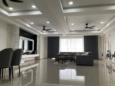 a living room with a couch and a tv at Horizon Luxe WiFi n KTV in Sitiawan