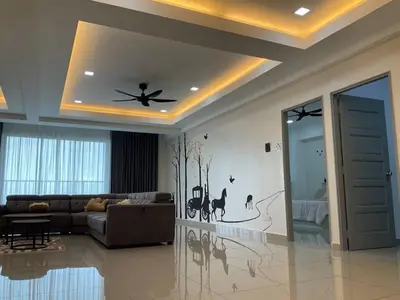 a living room with a couch and a ceiling at Horizon Luxe WiFi n KTV in Sitiawan