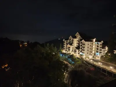 a view of a building at night at A23A5 Silverpark HighFloorView in Bukit Fraser