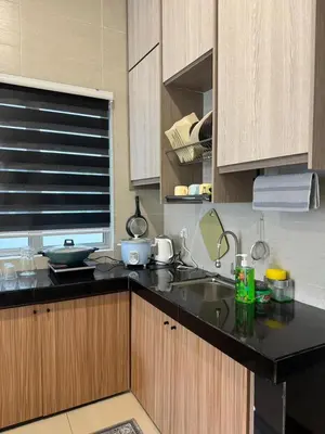 a kitchen with a sink and a counter top at Ayaan FIFA Hub Quintet House - Ultimate Gaming Stay in Tanah Rata