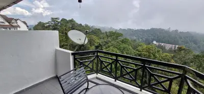 a balcony with a satellite dish on the side of a building at B10-5-1 Silverpark Resort -No Lift in Bukit Fraser
