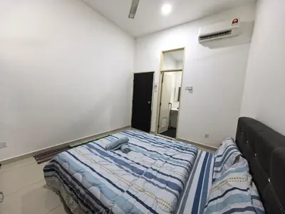 a small bedroom with a bed in a room at Bertam Holiday Homestay 01 in Kepala Batas