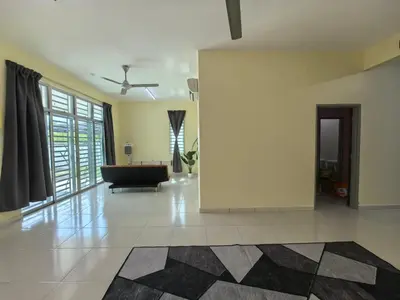 a large living room with a tub in the middle at Padang Serai Wangi Homestay 71 in Padang Serai