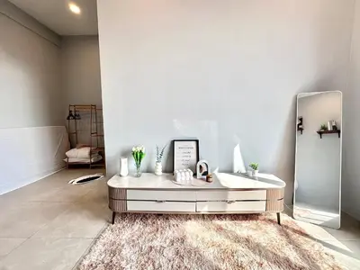 a bathroom with a dressing table and a mirror at Aston Acacia Residence Bukit Mertajam in Bukit Mertajam