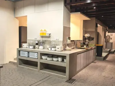 a kitchen with a counter in a large kitchen at Mutiara Gurney bySOL at Genesis IVF, Gurney Paragon in George Town