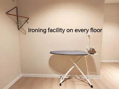 a table in front of a wall with the words incoming facility on every floor at Mutiara Gurney bySOL at Genesis IVF, Gurney Paragon in George Town