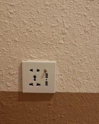 a white electrical outlet on the side of a wall at Mutiara Gurney bySOL at Genesis IVF, Gurney Paragon in George Town