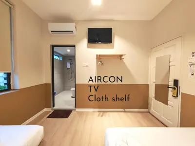 a room with a bathroom with a tv on the wall at Mutiara Gurney bySOL at Genesis IVF, Gurney Paragon in George Town