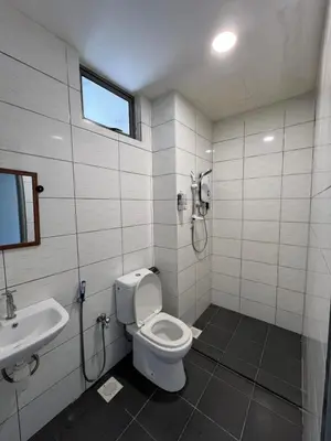 a bathroom with a toilet and a sink at Palas Horizon By Lume' Living Homestay near Kea Farm Market, 2Bedroom, Sunrise View in Brinchang