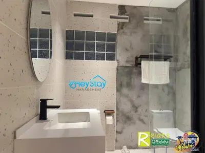 a bathroom with a sink and a mirror at MalayaVilla 5R3B16Pax PrivatePool Karaok PlayGround in Gua Sai
