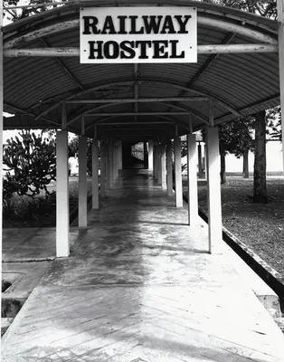 a walkway with a sign that reads railway hospital at Railway Hostel in Batu Gajah