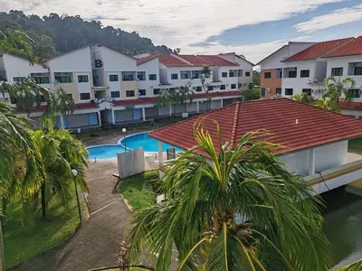 an aerial view of a resort with a swimming pool at Pangkor Lot10 Vacation Studio in Pangkor