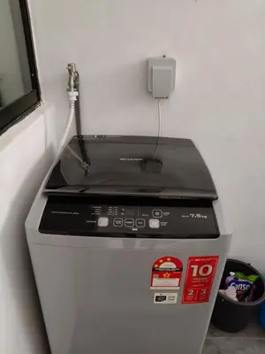 a fax machine with a phone on top of it at Bertam Perdana Homestay