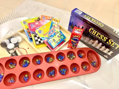 a toy train with candy and snacks on a table at Klebang Cozy Homestay in Chemor