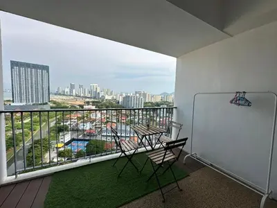 a balcony with a view of a city at Spacious Comfy 8pax, 3 Bedroom, 2 Car Park, The Landmark in Tanjong Tokong