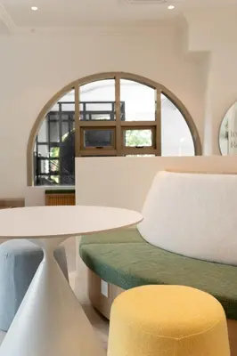 a room with a table and chairs and a window at 22 Macalisterz George Town By KLIQ in George Town