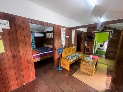 an aerial view of a room with a bedroom at Capital O 91206 Homestay Pelangi Ban Pecah. (muslim Only)