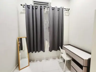 a bedroom with a black shower curtain and a desk at Ipoh Seri Botani 5br22 pax bbq mahjong in Kampong Kepayang