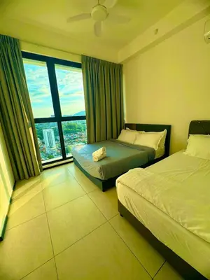 a hotel room with two beds and a large window at Stylish 3BR Retreat w Stunning Sea Views Fits 10 A29 in George Town