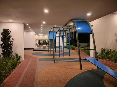 a playground with a blue slide in a building at Luxury 3BR Seaview Getaway Perfect for 10 Guests A29 in George Town