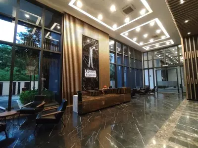 a lobby of a building with chairs and windows at Luxury 3BR Seaview Getaway Perfect for 10 Guests A29 in George Town