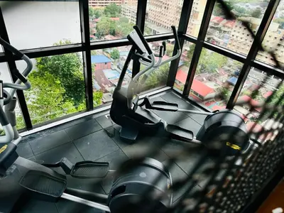 a view of a gym with two treadying machines at Modern 3BR w Panoramic Ocean Views Sleeps 10 A29 in George Town