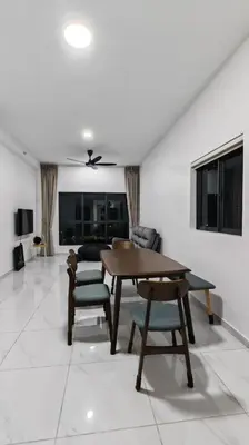 a living room with a wooden table and chairs at Brand NEW Modern Cozy Retreats 3BR2B2P for 6 in Batu Kawan