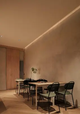 a group of tables and chairs in a room at Bishop House in George Town