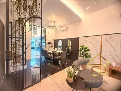 a dining room with a table and chairs at GatherLuxe Ipoh, Landed 14Pax, KTV, Kids Room, Baby Cot in Chemor