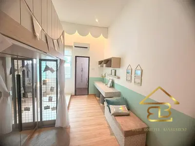a room with two benches in a room at GatherLuxe Ipoh, Landed 14Pax, KTV, Kids Room, Baby Cot in Chemor
