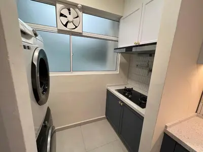 a small kitchen with a washing machine and a window at Middle Room Only in Bayan Lepas Share Space in Bayan Lepas