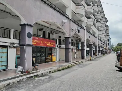 an empty street in front of a building at Ed 03 lumut Waterfront in Lumut