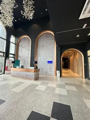 a lobby of a building with a reception desk at 22 Macalisterz 2025 Georgetown Premium \u9876\u697c\u65e0\u8fb9\u6cf3\u6c60 in George Town