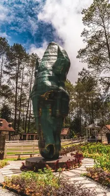 a statue of a cat in a park at A3-6-1Silverpark LuxMountsin view Lifted unit in Bukit Fraser